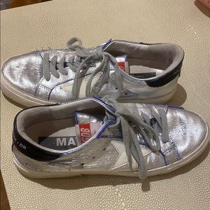 Worn golden goose sneakers
